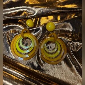 Yellow lucite clip on earrings